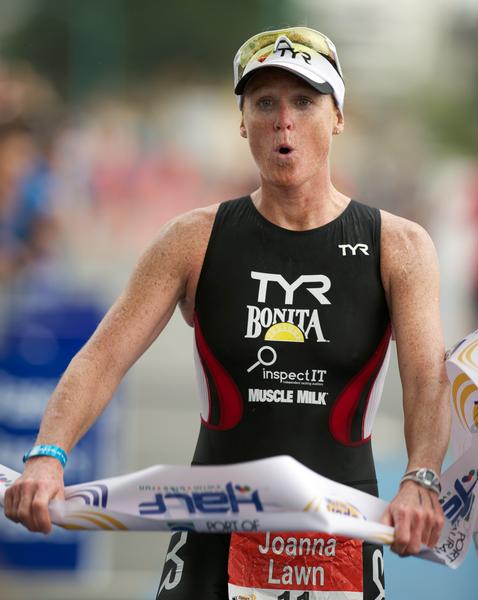 Joanna Lawns shows the signs of battle after winning the Port of Tauranga Half for a record fourth time at Mount Maunganui today